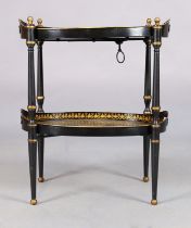 An English oval toleware two tier table, Regency style, 20th century, gilt decorated with flora a...