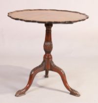An English mahogany tilt top table, George II style, last quarter 19th century, the pie crust top...