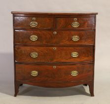 A George III mahogany bow front chest, first quarter 19th century, two short and three long gradu...