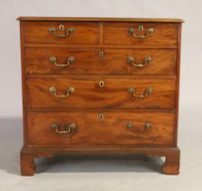 A George III mahogany chest, last quarter 18th century, two short over three long drawers, on bra...