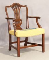 An English mahogany armchair, George III style, last quarter 19th century, the pierced splat back...