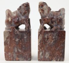 A pair of Chinese mythical beast soapstone seals, Luduan, 20th century, each of rectangular form,...