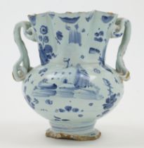 A Savona maiolica twin-handled vase, c.1700, blue Savonese shield mark to underside, the bulbous ...