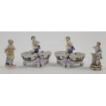 A group of German porcelain, 20th century, to include: a Meissen style figure of a young girl hol...