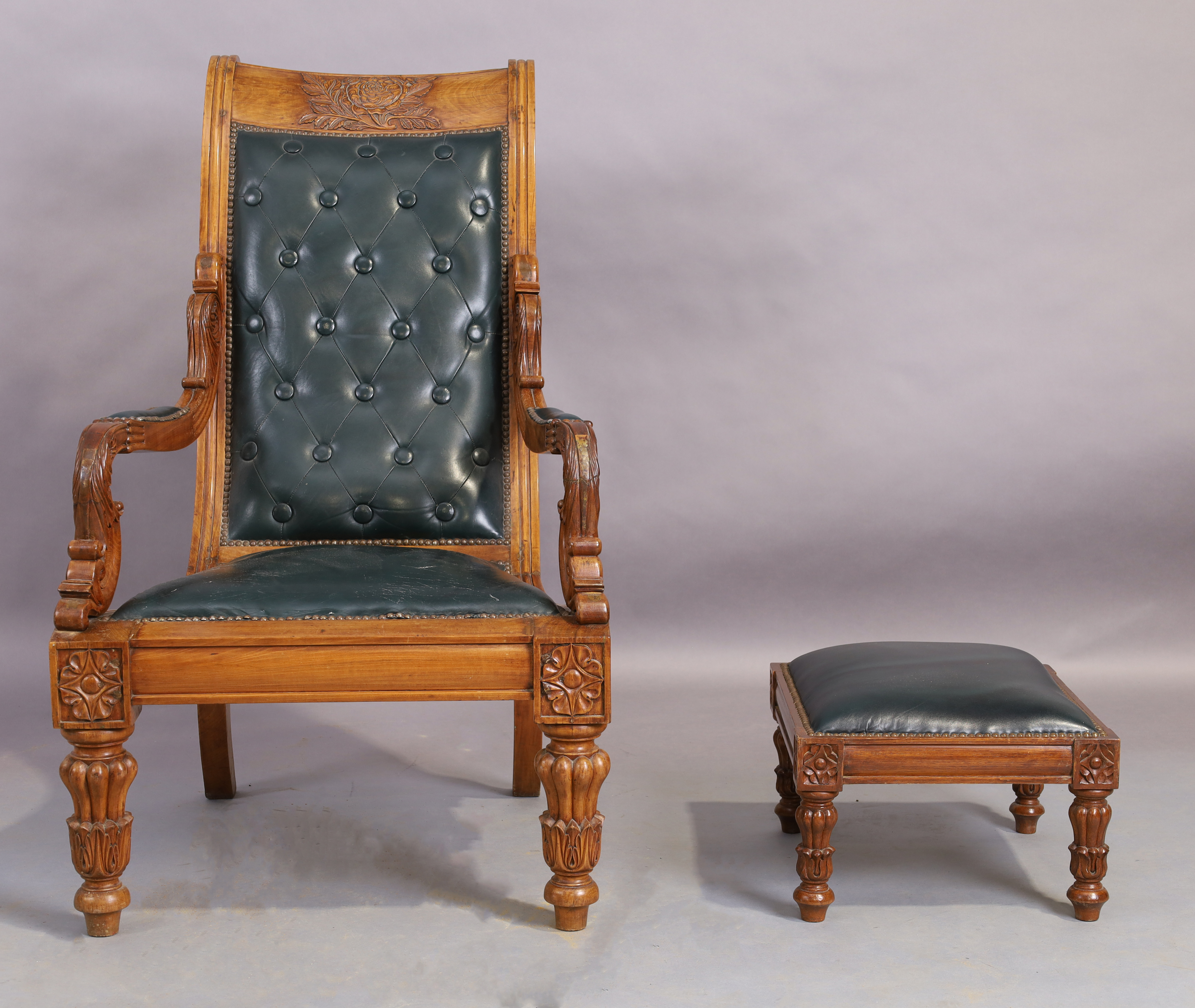 An Indonesian carved button back arm chair and stool, William IV style, 20th century (2) - Image 2 of 4