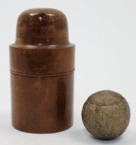 A feather filled replica display golf ball, probably 20th century, with glued seams and worn leat...
