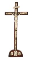 A bone-inlaid rosewood crucifix, possibly French, possibly 17th century, with central bone Corpus...