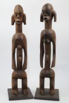 A pair of carved wood Lagalagana figures, Mumuye, Nigeria, comprising a male and female figure, e...