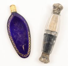 A gilt heightened blue glass scent bottle, 19th century, of faceted lozenge form with gilt screw-...