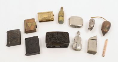 A group of novelty vesta cases, 19th - 20th centuries, comprising: two Bakelite examples in the f...