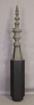 A zinc lightning conductor, early 20th century, in the form of a baluster finial, on later ebonis...