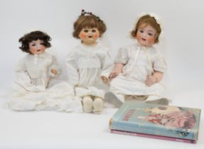 A collection of dolls, to include a group of three Armand Marseille 'Dream Babies', model 351, ea...