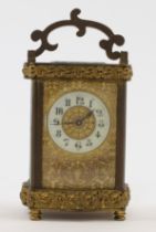 A French gilt-brass carriage clock, 19th century, the case with serpentine foliate border edges, ...