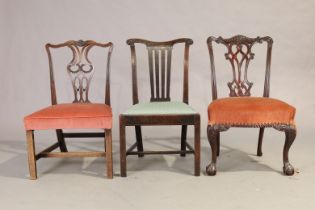 A George III oak side chair, last quarter 18th century, and two English mahogany side chairs, las...