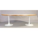 An Arkana oval dining table, third quarter 20th century, with twin tulip pedestal base, 73cm high...