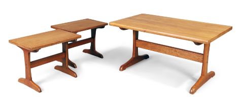 Peter Kuh, an oak coffee table and two side tables, c.1977-87, the coffee table 46cm high, 91cm w...