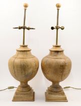 A pair of large wood baluster table lamps, 20th century, with natural exposed wood finish, each w...