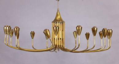 An Italian brass chandelier, c.1950s, with eighteen slender arms issuing from a central cylindric...