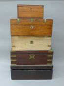 A quantity of 19th century writing slopes and a tea caddy. The largest 45.5 cm wide.