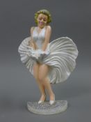 A Marilyn Monroe form doorstop. 33.5 cm high.