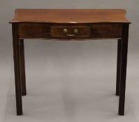 A 19th century mahogany Serpentine side table. 85 cm wide.