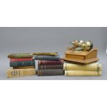 A quantity of various books, a vintage telephone, a vintage Scalextric Datsun,