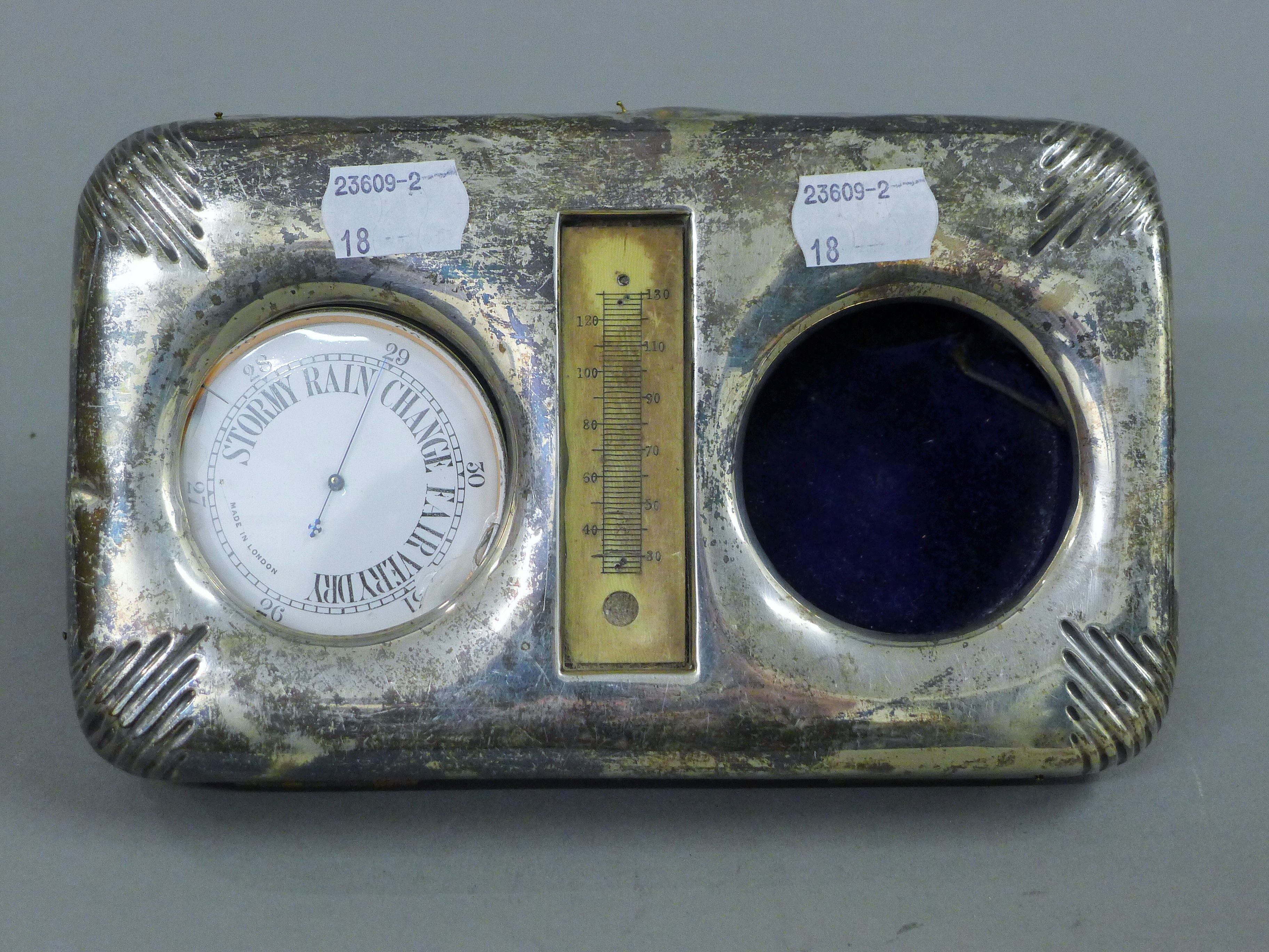 A silver plated barometer set in a silver case (case lacking watch). 19.5 cm wide. - Image 2 of 6