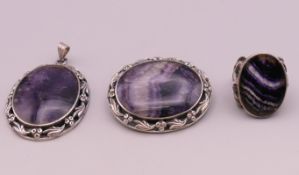 A Blue John set ring, a pendant and a brooch. The pendant 5 cm high.