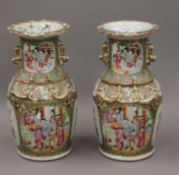 A pair of 19th century Canton famille rose porcelain vases. 35 cm high.