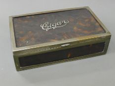 An early 20th century tortoiseshell mounted cigar box. 23.5 cm wide.