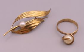 A 9 ct gold pearl brooch and ring. Ring size P/Q. 7 grammes total weight.