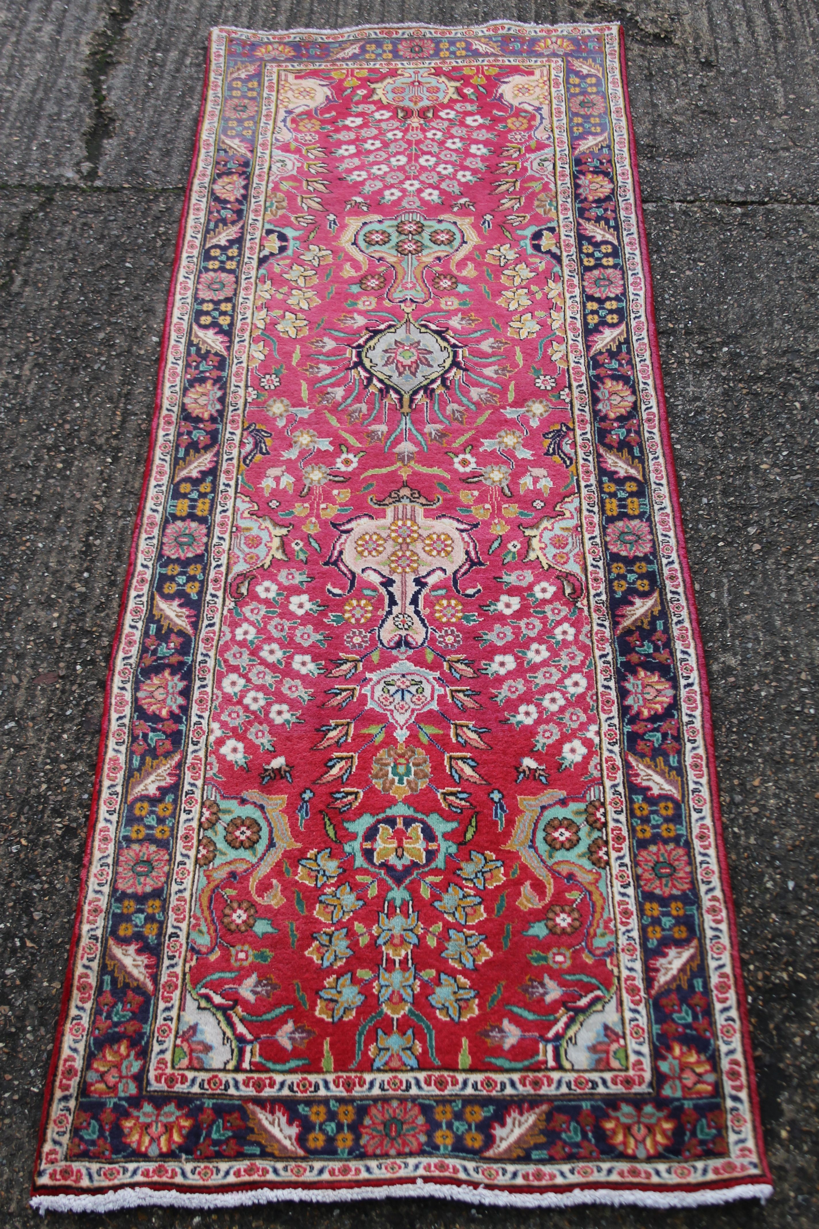 A Hamadan runner. 300 x 97 cm.