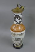 A Chinese porcelain vase, fitted as a lamp. 68 cm high.