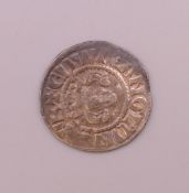 An antique silver coin.