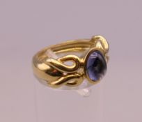 A 10 K gold cabochon ring. Ring size L. 7.4 grammes total weight.