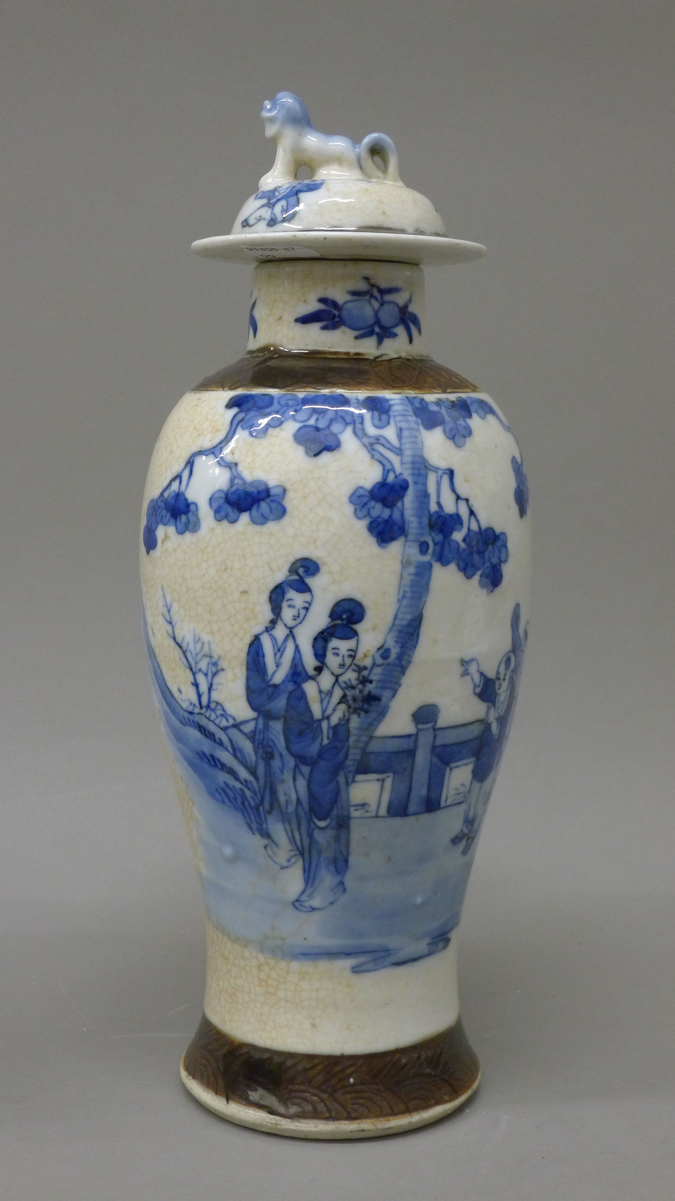 A pair of 19th century Chinese blue and white baluster vases and covers decorated with figures, etc. - Image 2 of 6