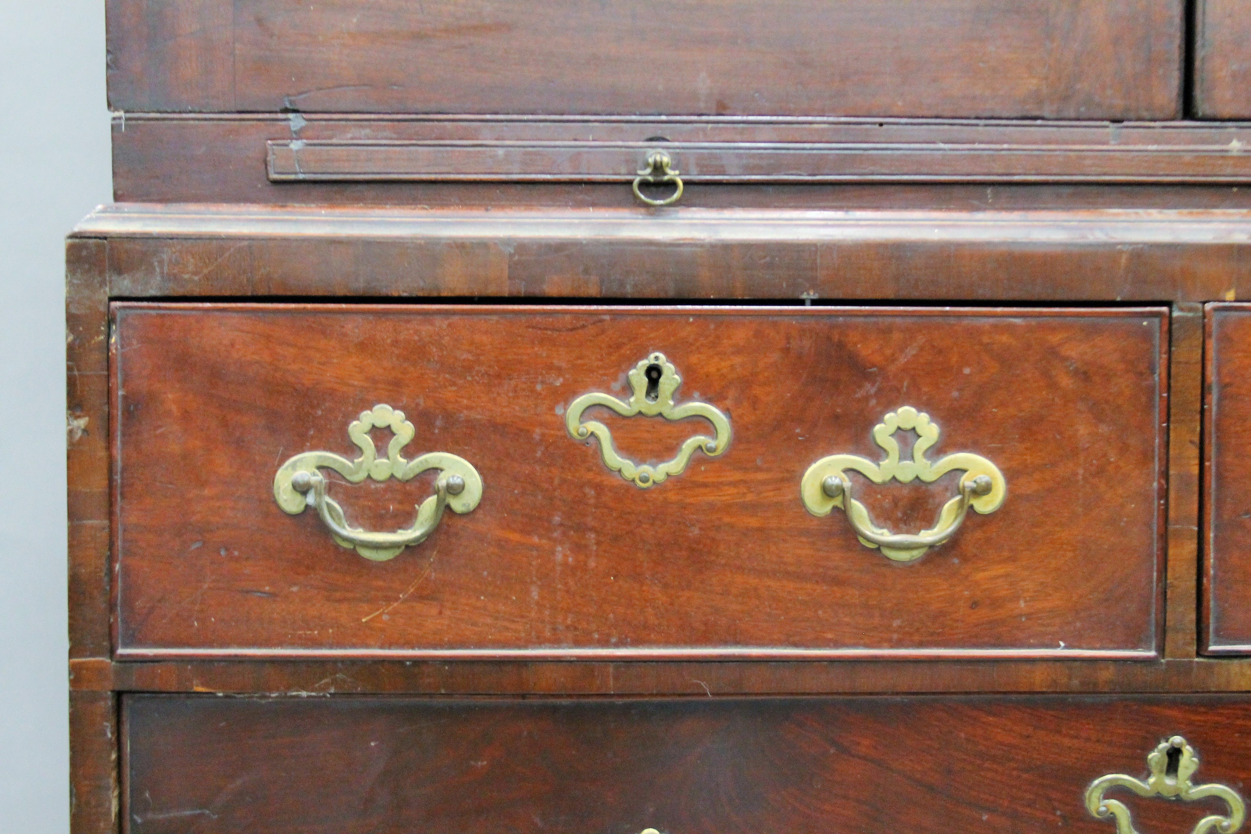 A Georgian mahogany linen press with gilt eagle surmount. Approximately 220 cm high x 118 cm wide. - Image 6 of 10