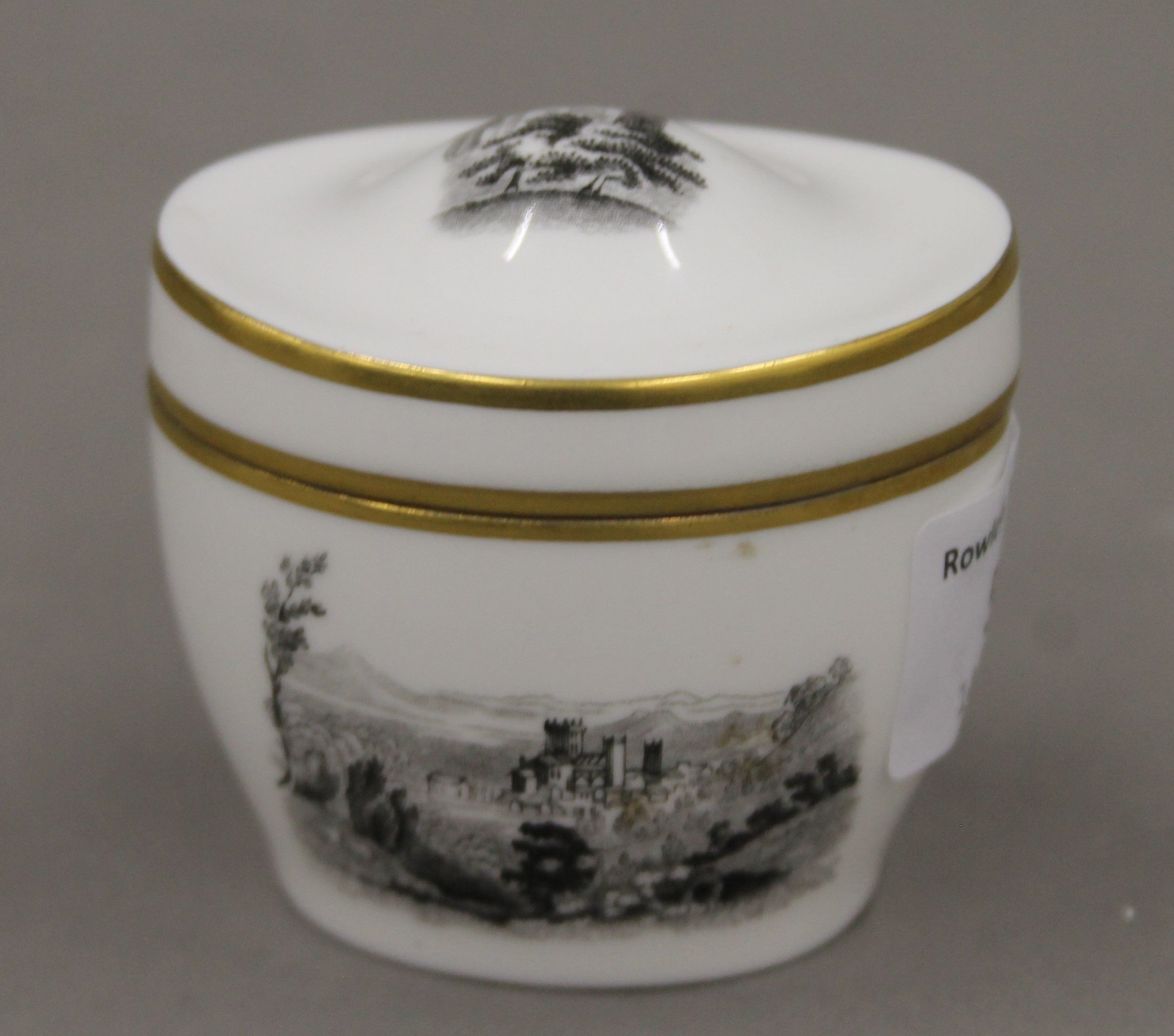 A Royal Worcester porcelain box. 6 cm wide.