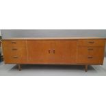 A mid-20th century side board. 182 cm long.