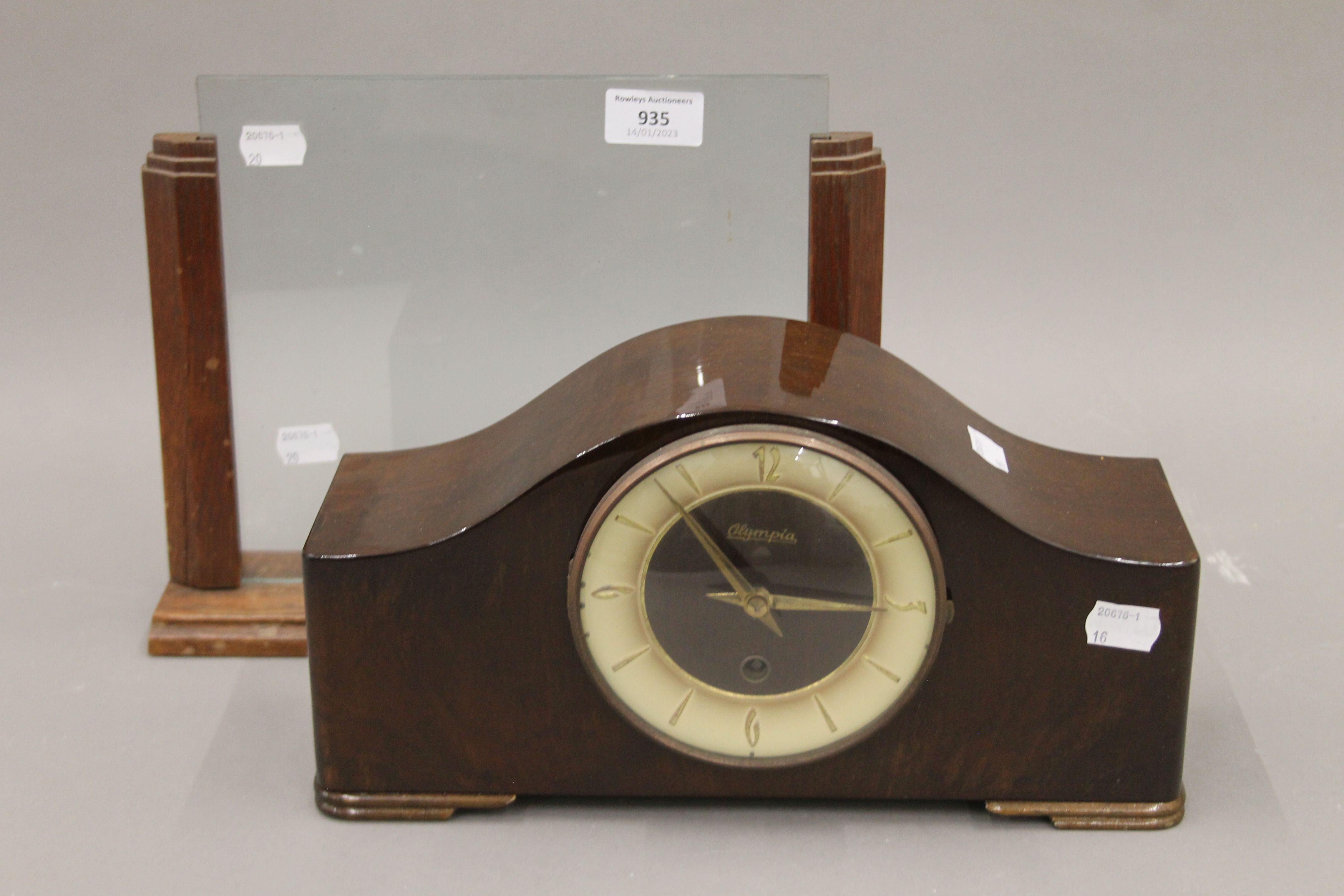 A mantle clock and an Art Deco glass picture frame. The former 31 cm wide.