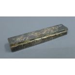A small embossed and beaten silver hinged lidded box. 15 cm long. 86.9 grammes.