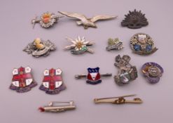 A quantity of various vintage badges.