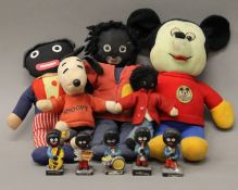 A quantity of various toys, including Mickey Mouse, gollies, etc.