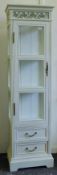 A modern white painted glazed cabinet. 46 cm wide x 163.5 cm high.