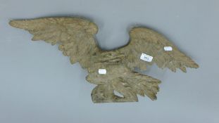 A cast iron eagle. 63 cm wide.