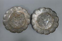 A pair of Japanese unmarked white metal lobed dishes with copper heightened decoration.