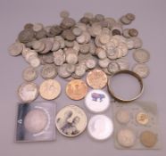 A quantity of coins and medallions, including some pre 1946.