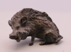 A cold painted bronze model of a boar. 5.5 cm long.