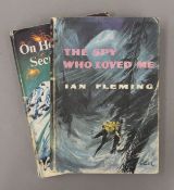 Two James Bond hardback books, On Her Majesty's Secret Service and The Spy Who Loved Me.