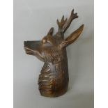 A Blackforest carved wooden deer mask. 27 cm high.